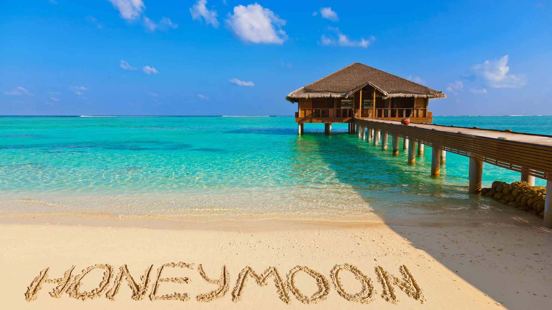 honeymoon-beach-sand-overwater-bungalow.jpg