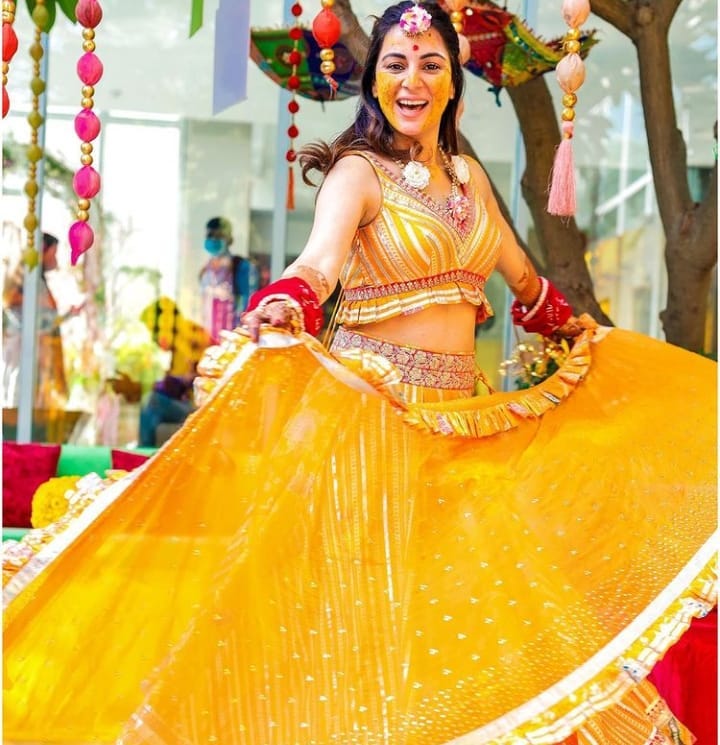 Kundali Bhagya actress Shraddha Arya shines in a beautiful yellow tie die lehenga at her haldi ceremony.